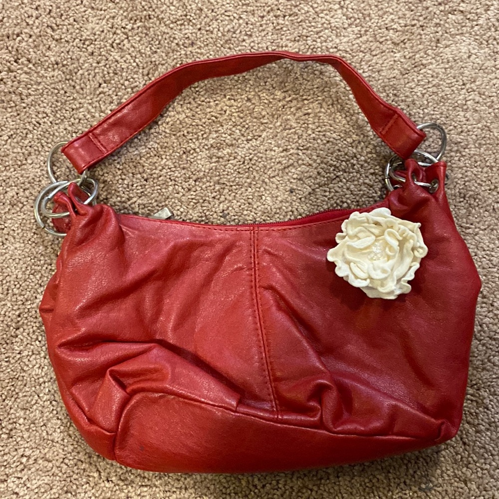 Red purse with flower detail